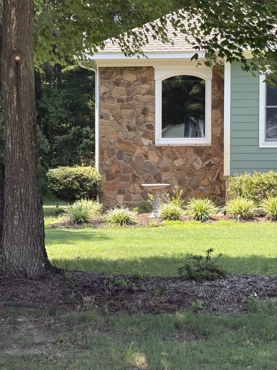 Natural stone chimney and gable stonework