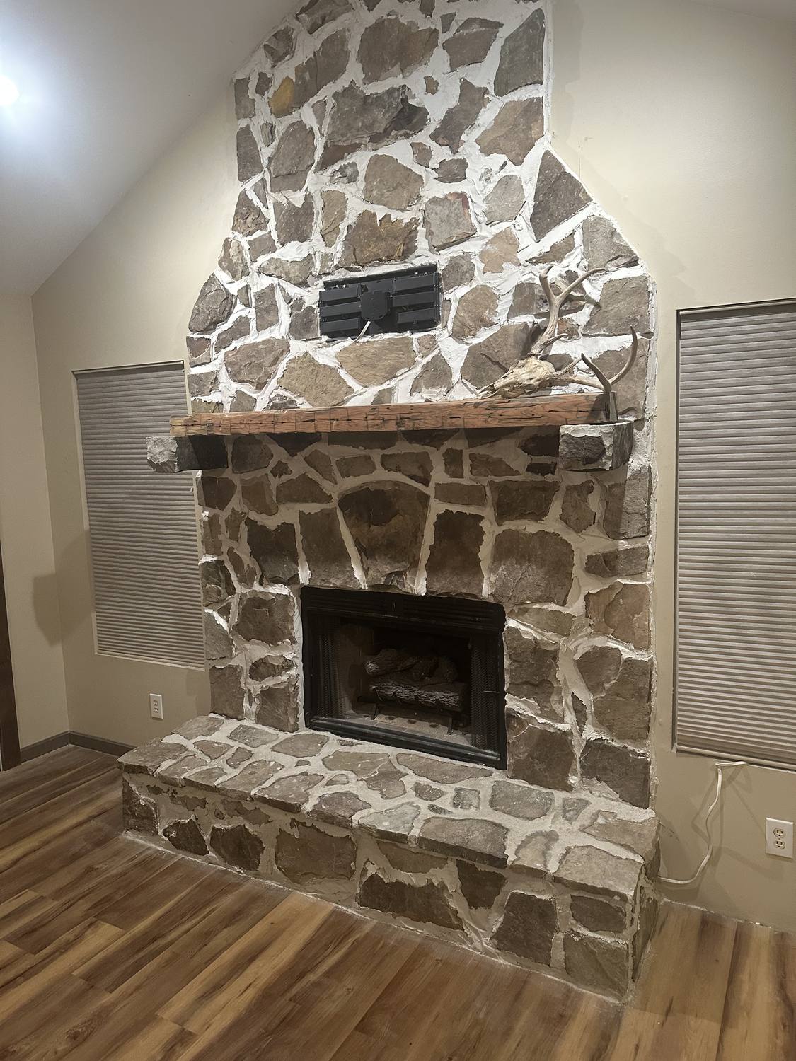Master mason craftsmanship — natural stone fireplace