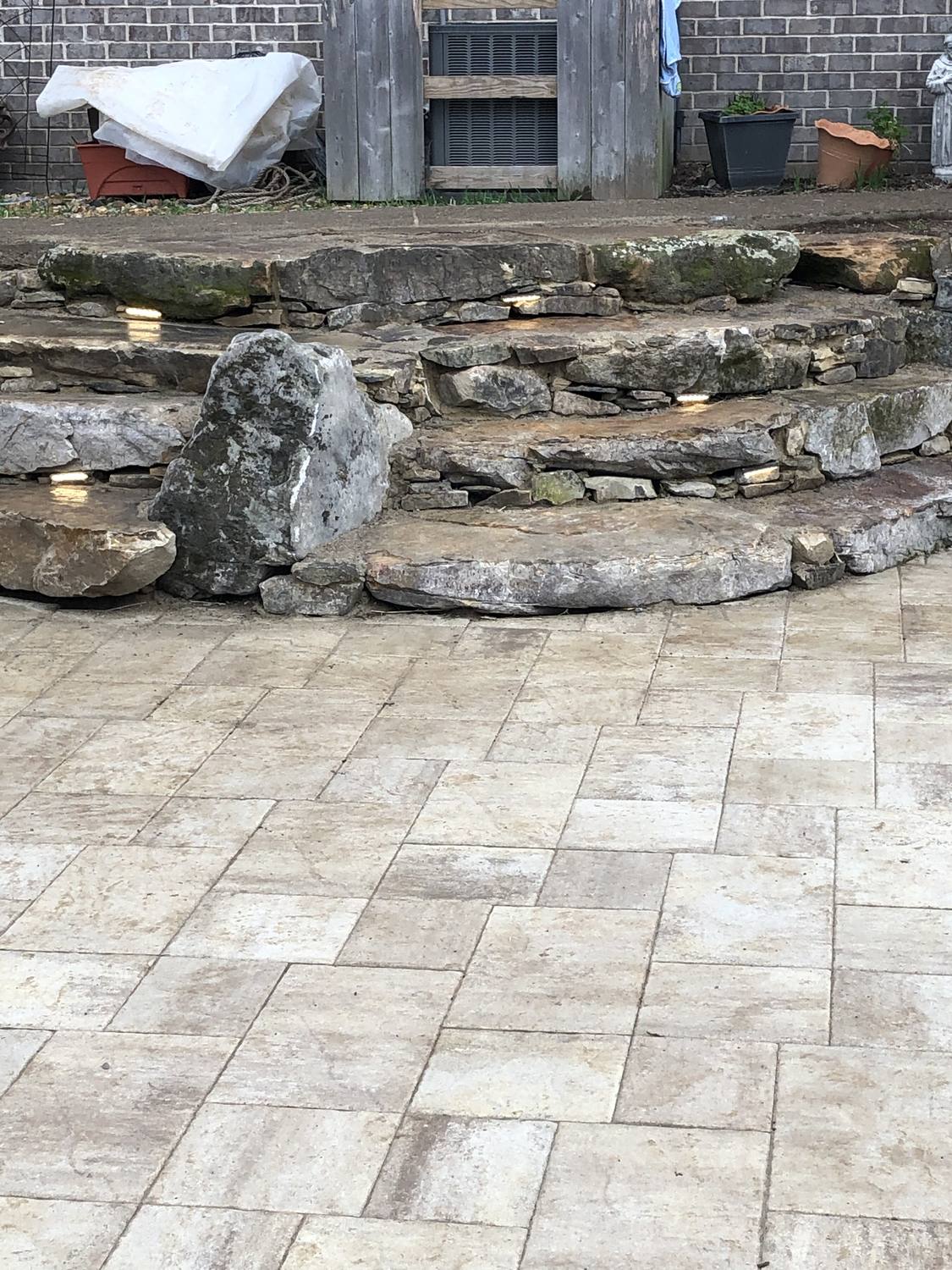 Natural stone steps and paver patio